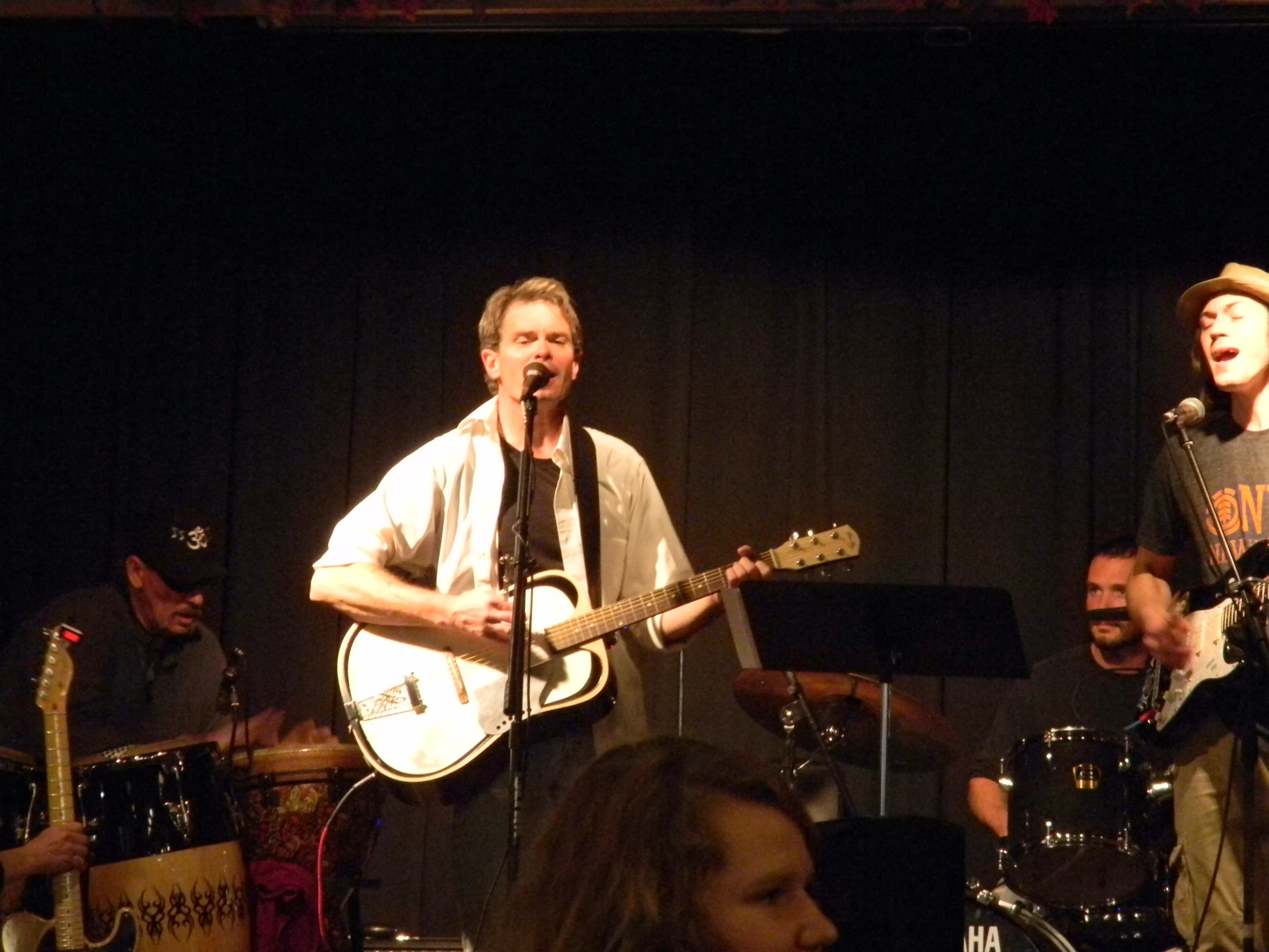 Guitarist Mike Rowell plays the Bouillez acoustic
