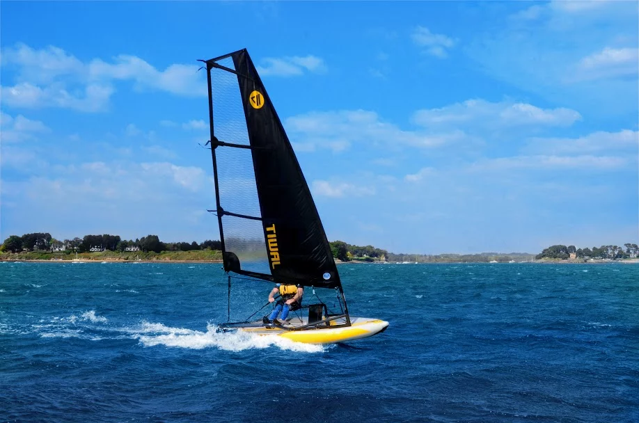 The saber shaped daggerboard provides the same upwind sailing ability as a traditional dinghy (Photo: Tiwal)