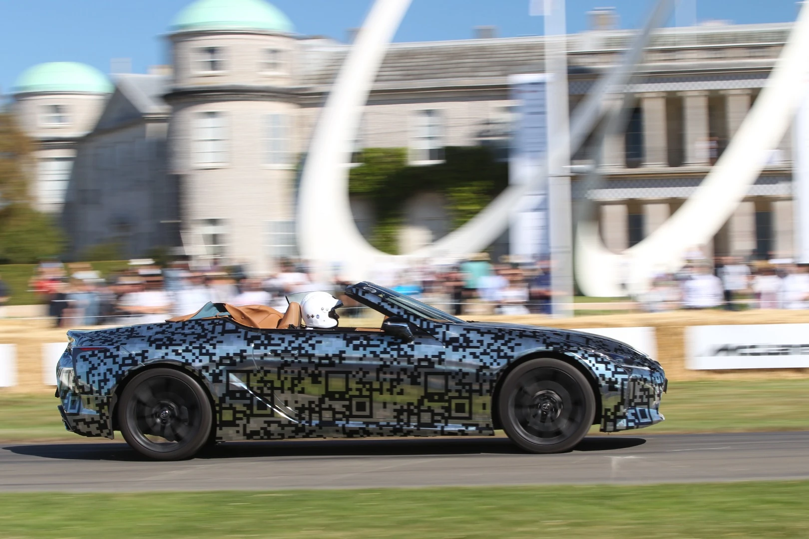 Lexus brought a camouflaged LC convertible prototype to Goodwodd