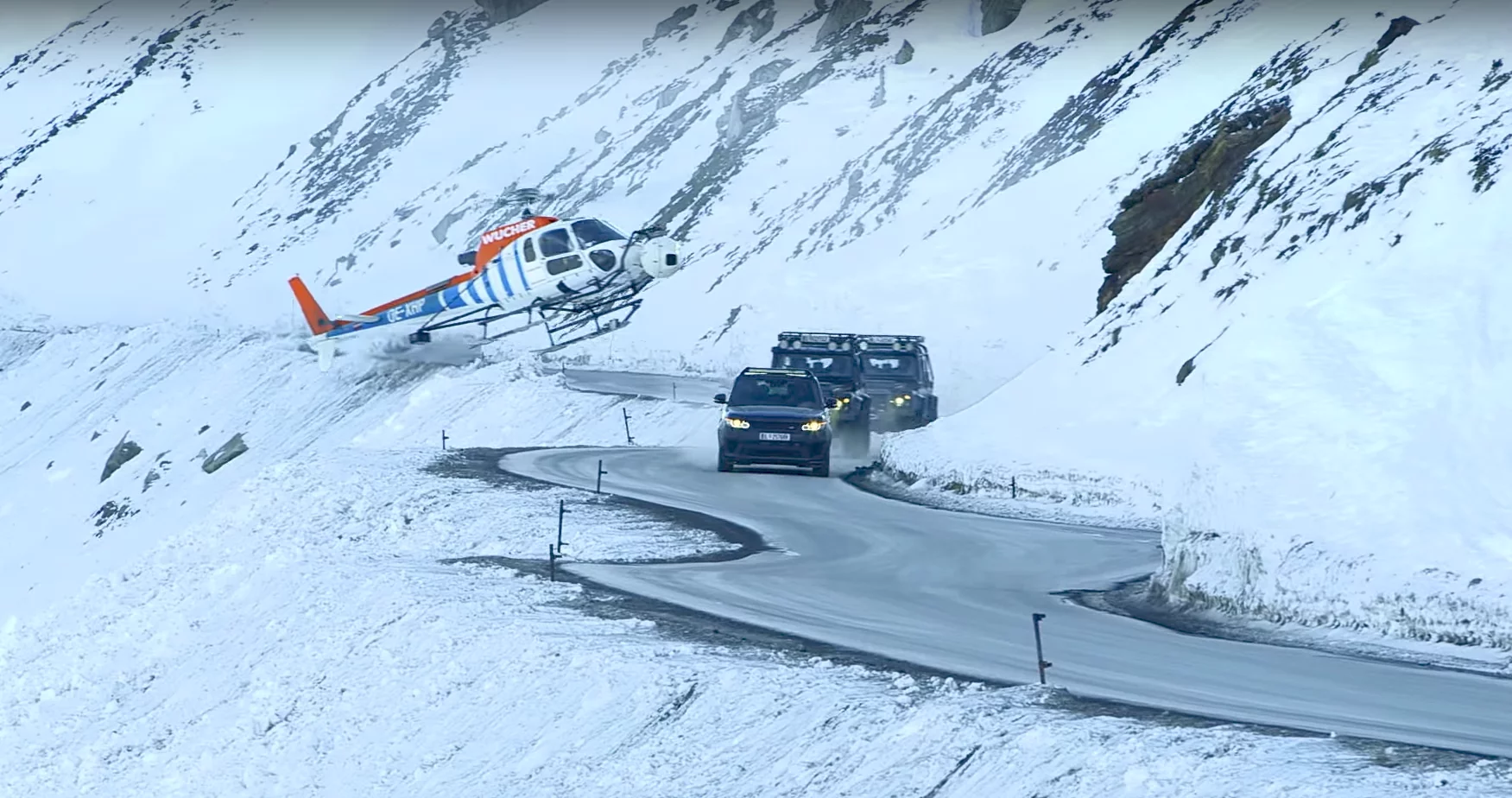 Jaguar Land Rover Special Operations built bespoke hero cars for the movie, being the Land Rover Defender SVX and Range Rover Sport SVR, seen here during the filming of SPECTRE.