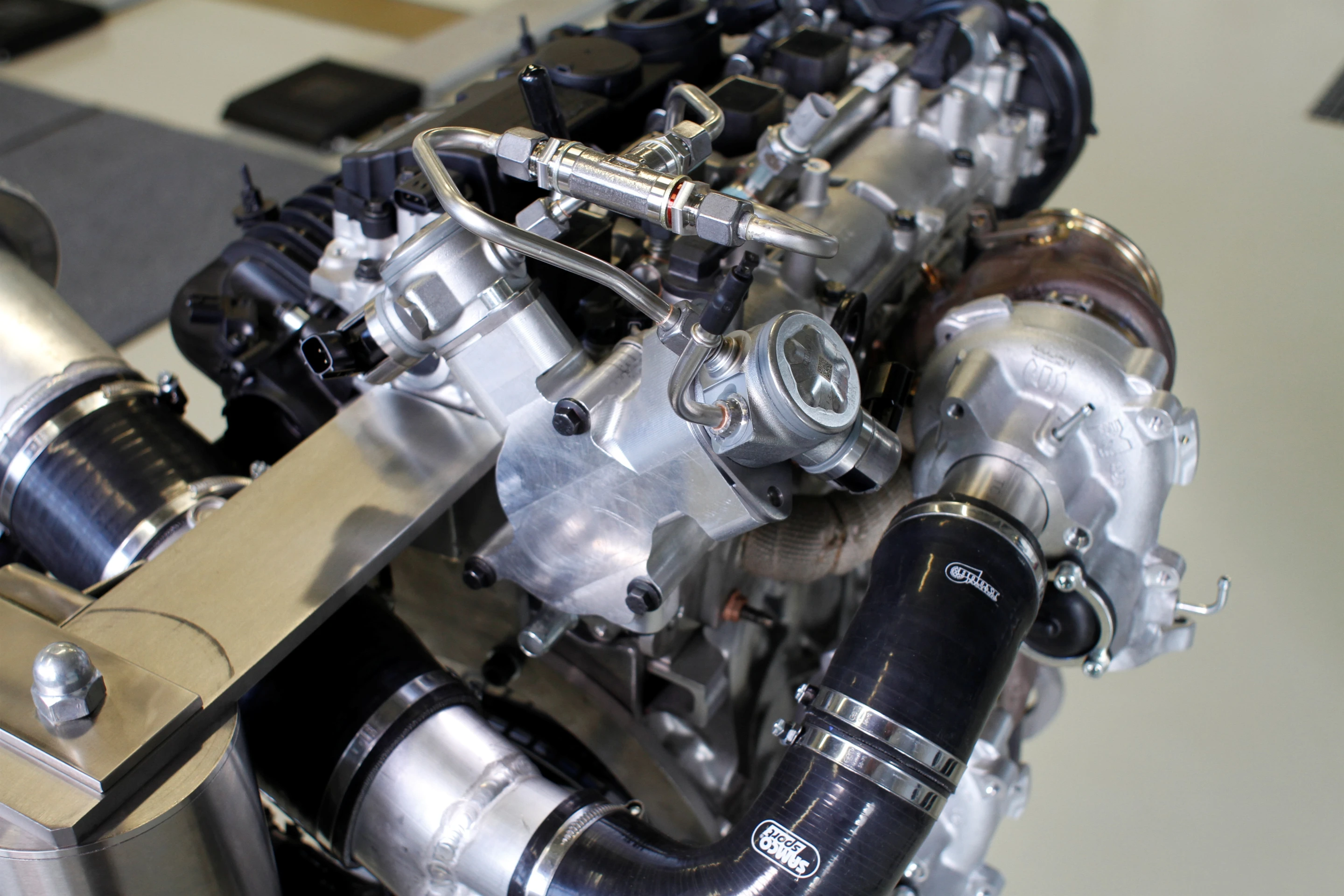 The triple boost 2.0 liter 4-cylinder gas engine that Volvo is working on is capable of developing power outputs on par with many high output V8s and race tweaked track engines