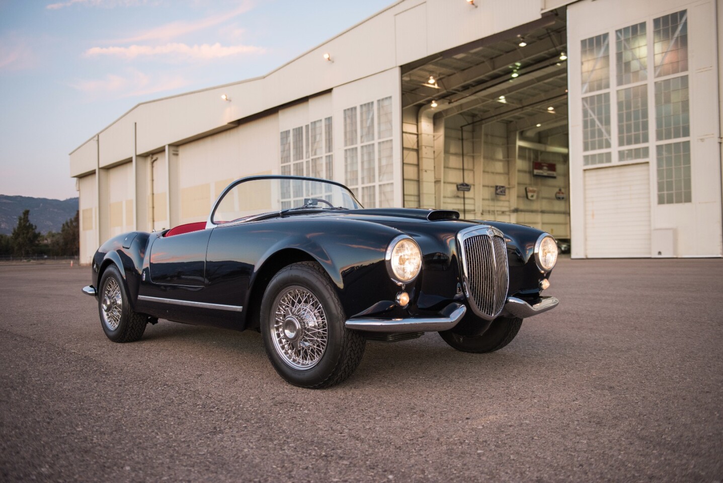 This 1955 Lancia Aurelia B24S Spider America by Pinin Farina has an estimated price: $900,000 to $1,100,000