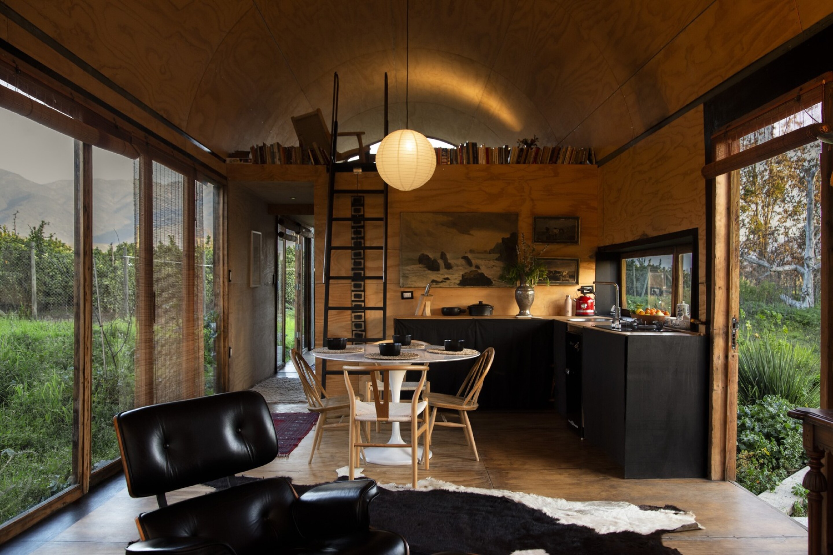Vaulted tiny house tastefully blends indoor/outdoor living
