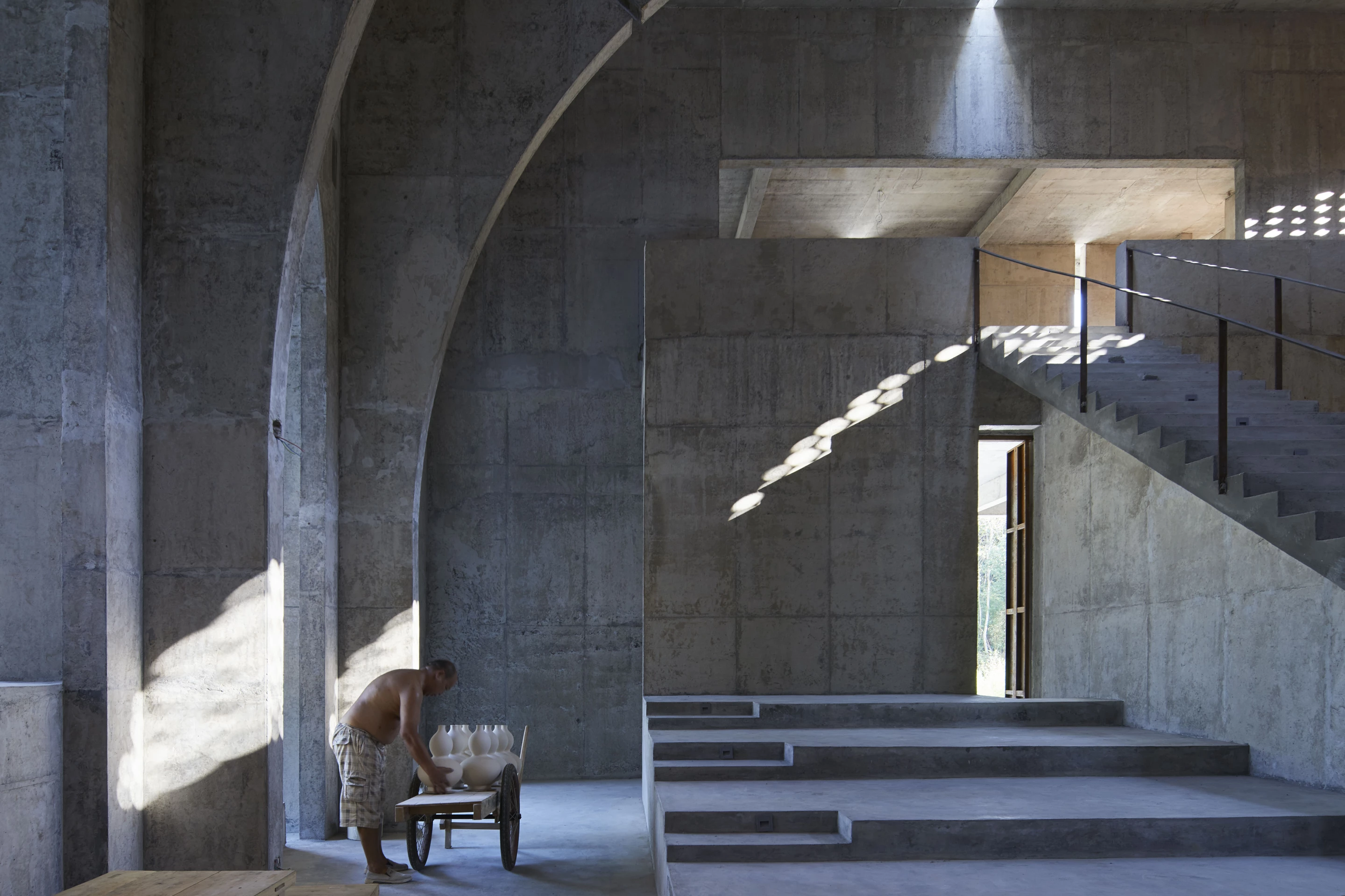 Chinese photographer He Zhenhuan won the Interior category with this photo of BingDing Wood Kiln Factory in Qiancheng village, China, by AZL Architects