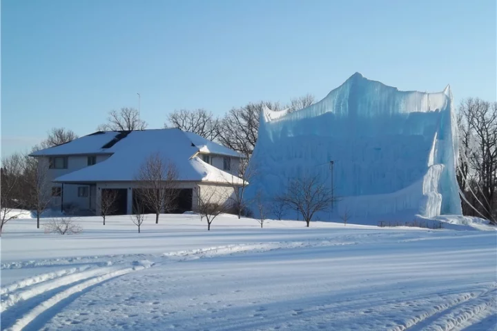 Roger Hanson's gigantic backyard ice sculpture for this year, made using water from his home's geothermal heating system