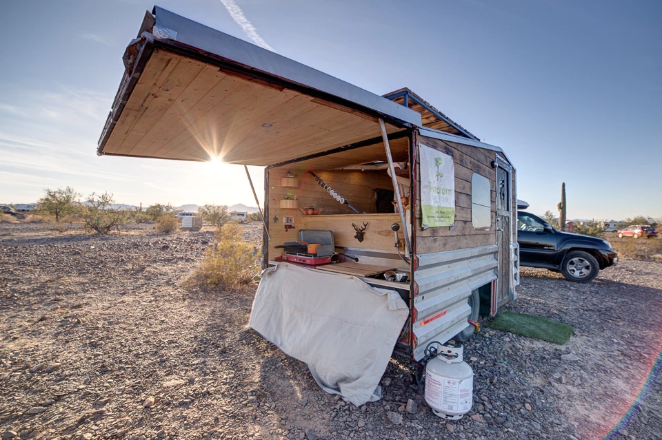 The Terraform Three's kitchen and shower is outside and accessed by lifting up a wall section