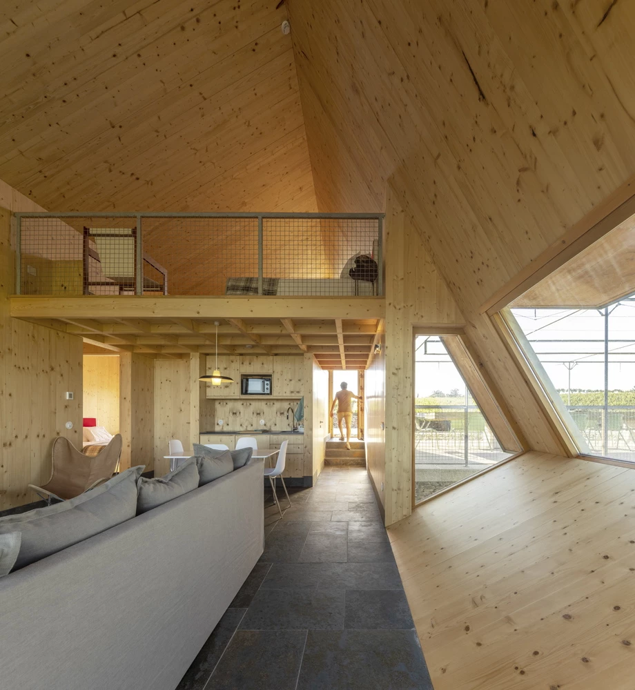 Angular walls and extra-large windows capture the beautiful surrounds