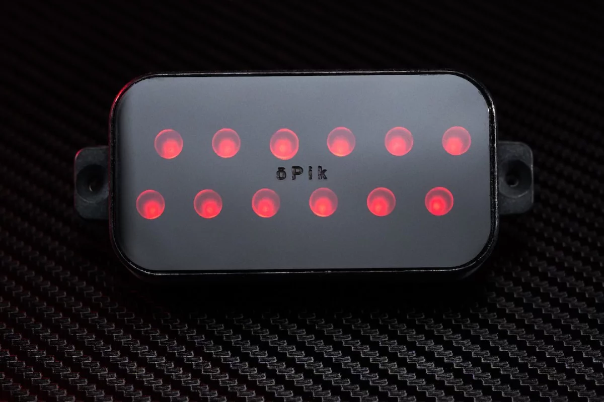 The ōPik is shaped like a traditional humbucker pickup, but uses infrared LEDs to convert string vibrations into a signal for output via a guitar amp