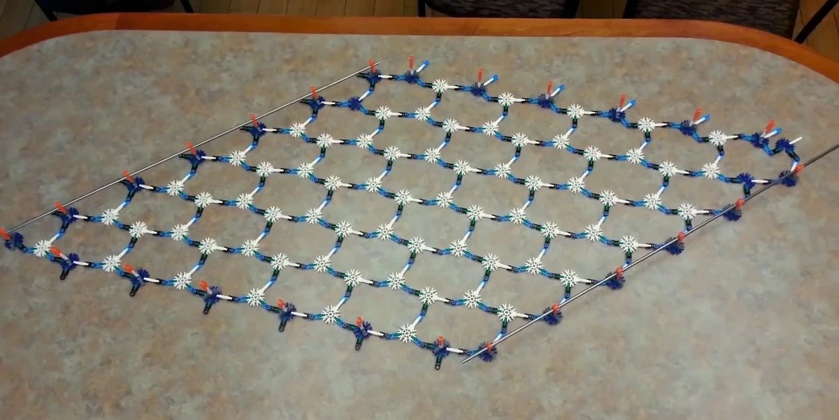 A new metamaterial, recreated here using K'Nex, can change its softness and hardness in response to low-level stress