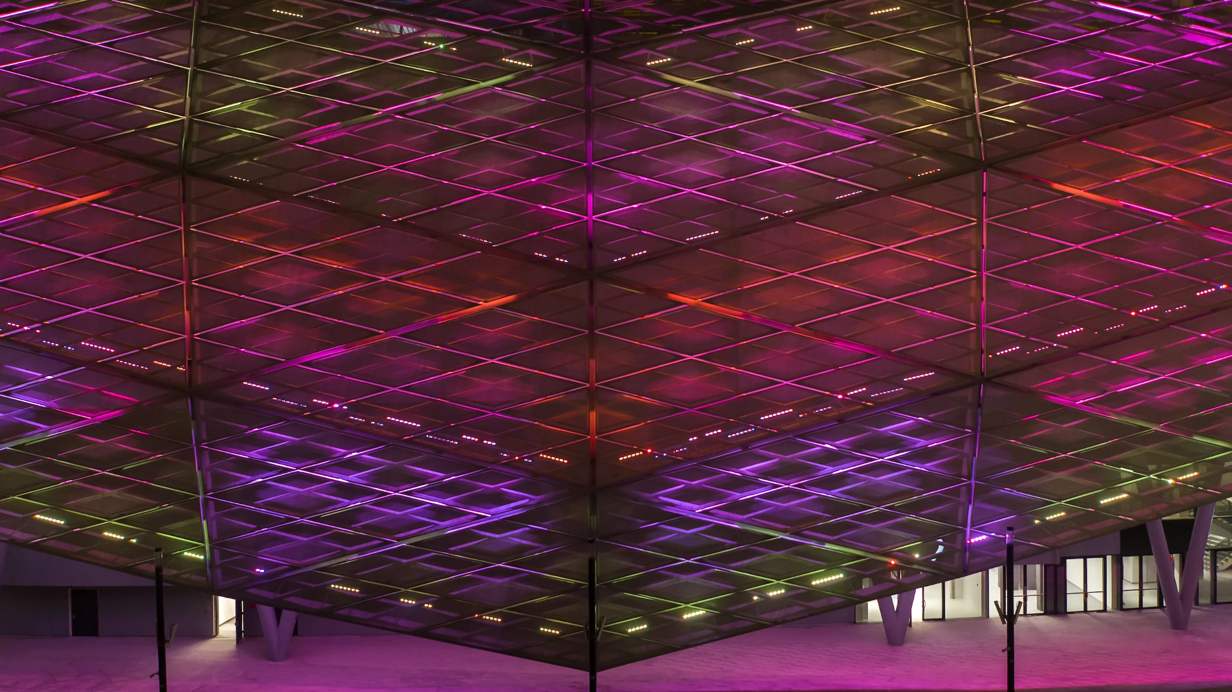 Education City Stadium's facade, shown illuminated with integrated lighting