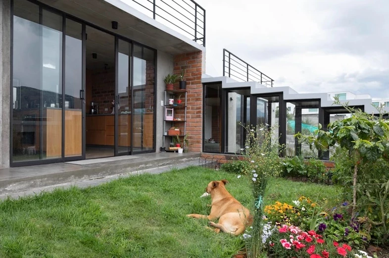 Each unit is encased by the beautiful curated external gardens