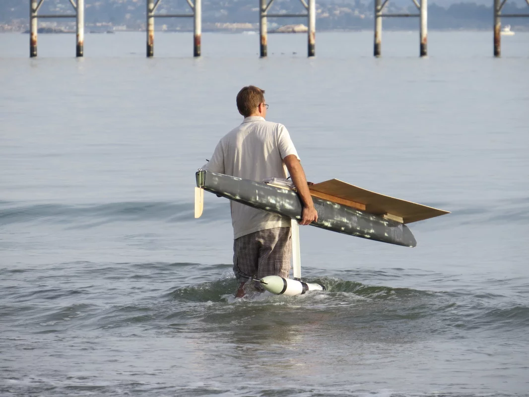 Damon McMillan taking a pre-PV version of the Seacharger for its first swim