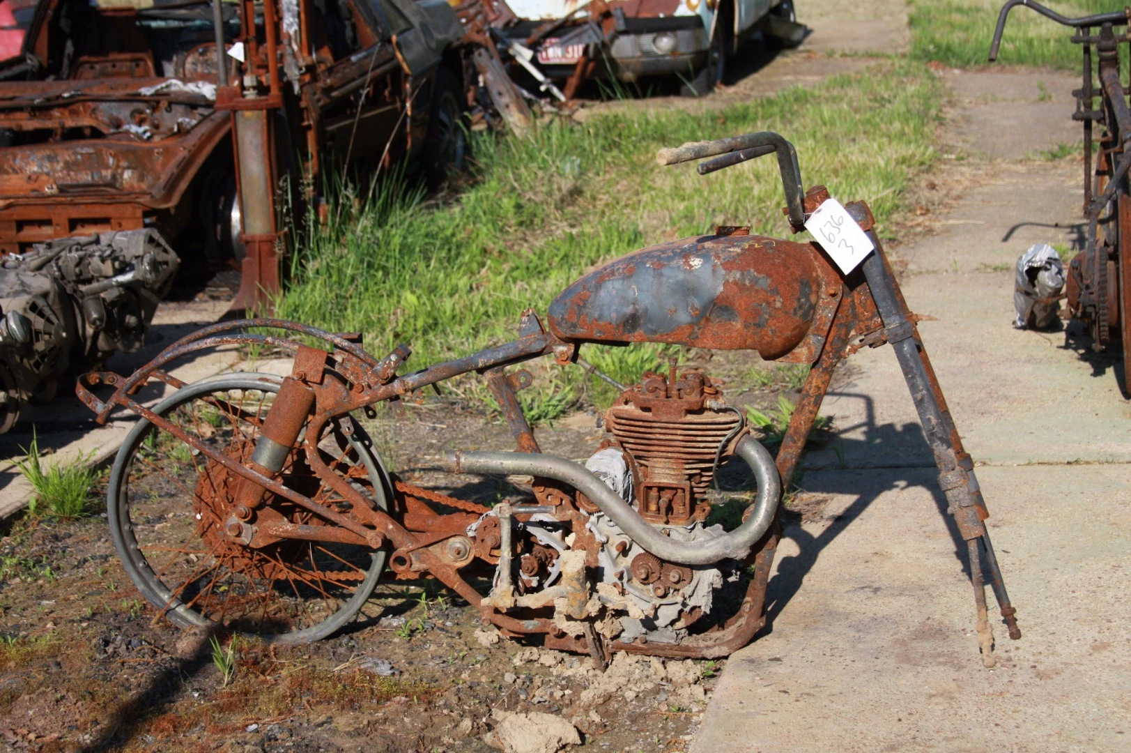 This Royal Enfield survived the fire ... to become yard art