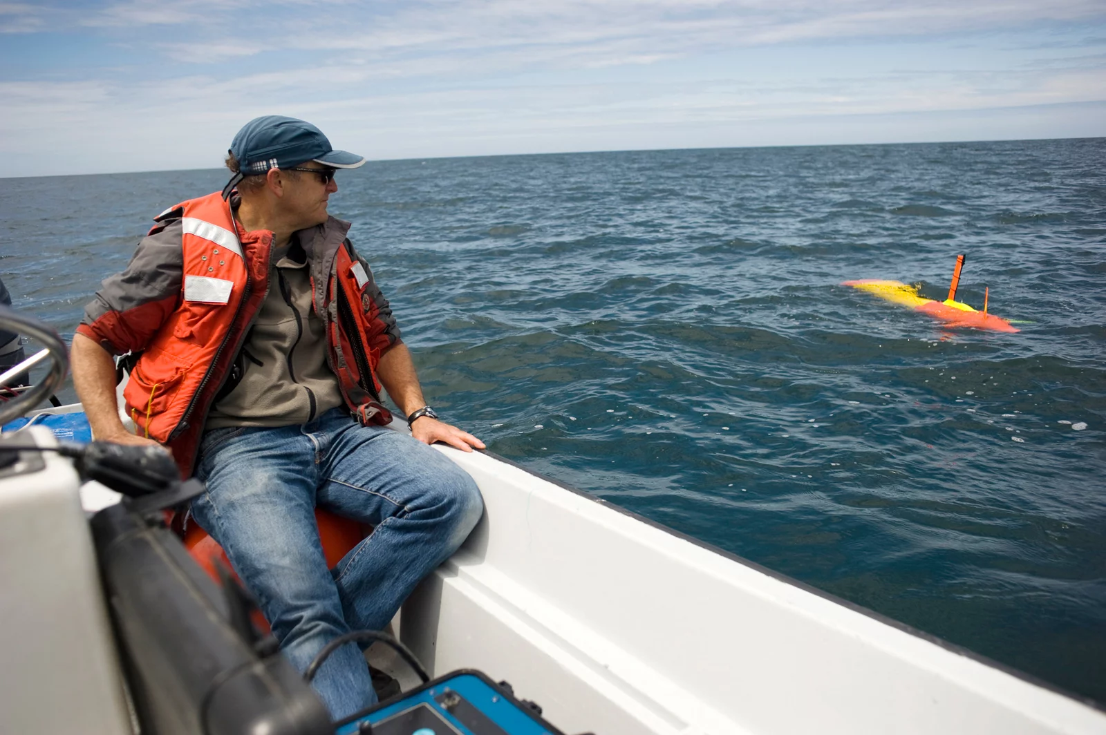 Bret Hobson watches Tethys floating at the sea surface in Monterey Bay (Image: Todd Walsh copyright 2010 MBARI)