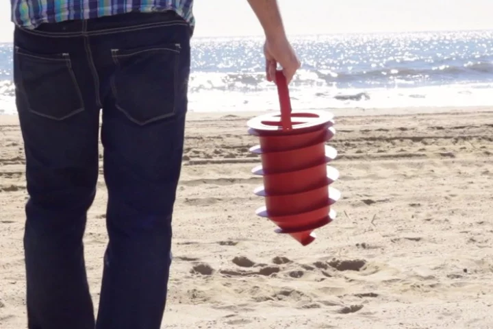 Beach Vault screws into the sand underneath your towel to keep your valuables out of sight