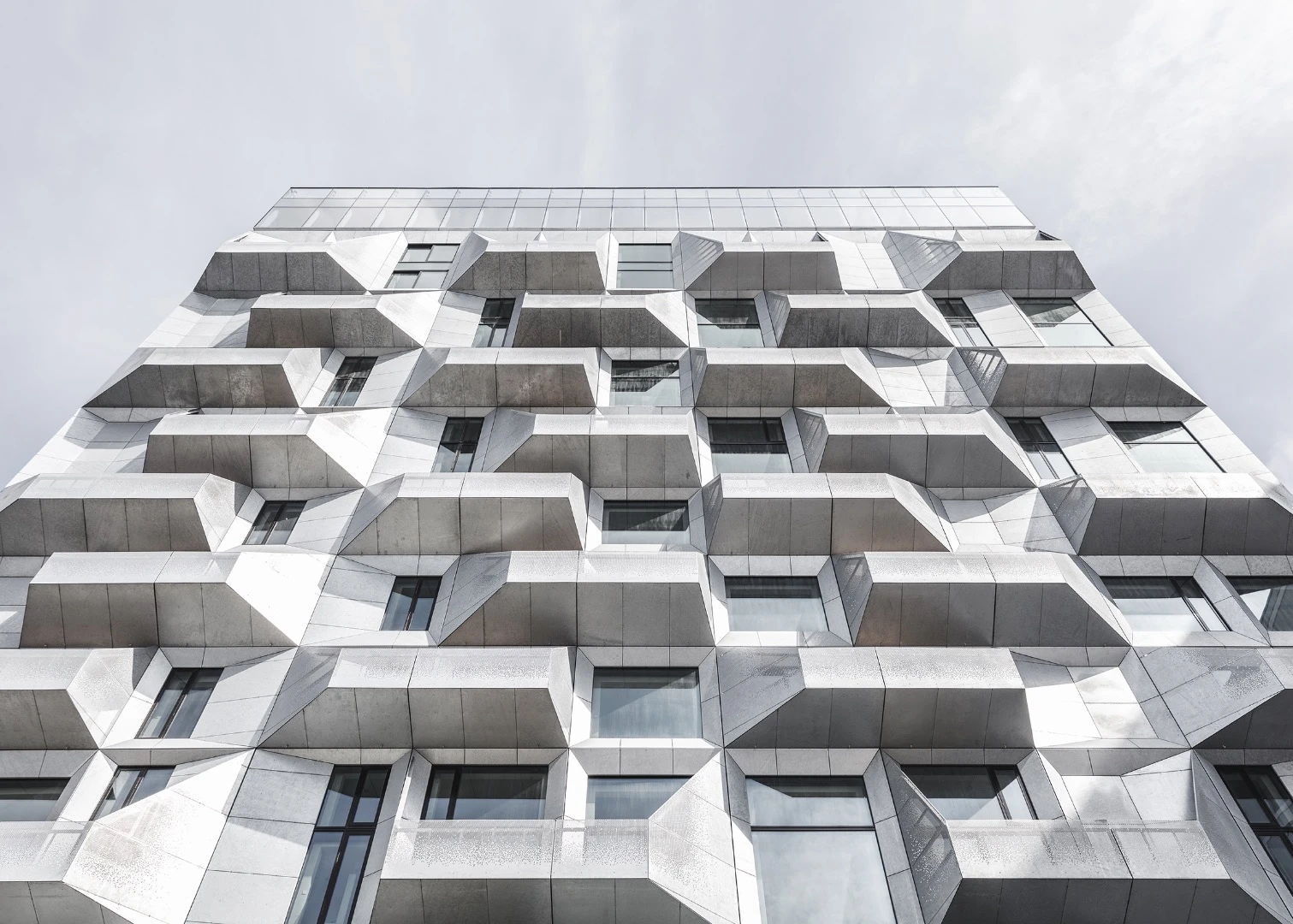 "We wanted to retain the spirit of The Silo as much as possible – both in terms of its monolithic exterior and majestic concrete interior, by simply draping it with a new overcoat," says Dan Stubbergaard, Founder and Creative Director of COBE