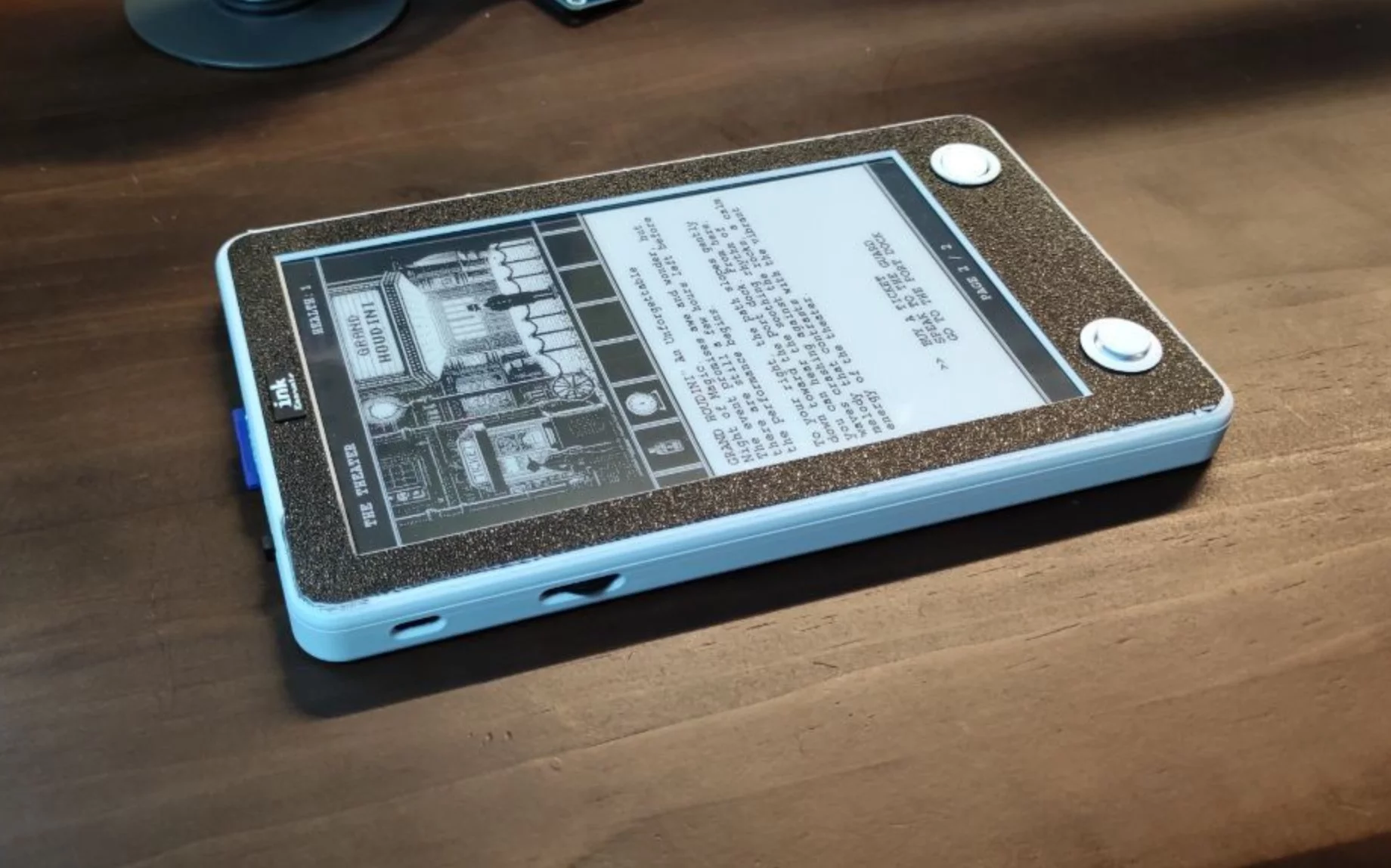 The Ink Console sports a 7.5-inch E Ink screen, an analog joystick input to navigate the story and a potentiometer for control