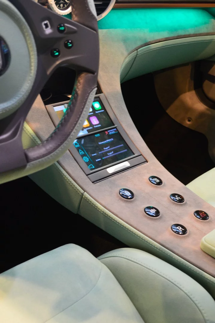 The Artega Scalo uses a two-part curved OLED infotainment screen