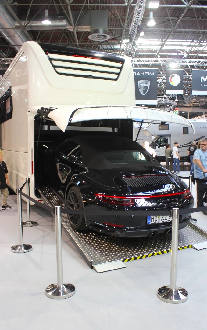 Morelo's flagship Empire Liner with a Porsche 911 Carrera 4 GTS in back