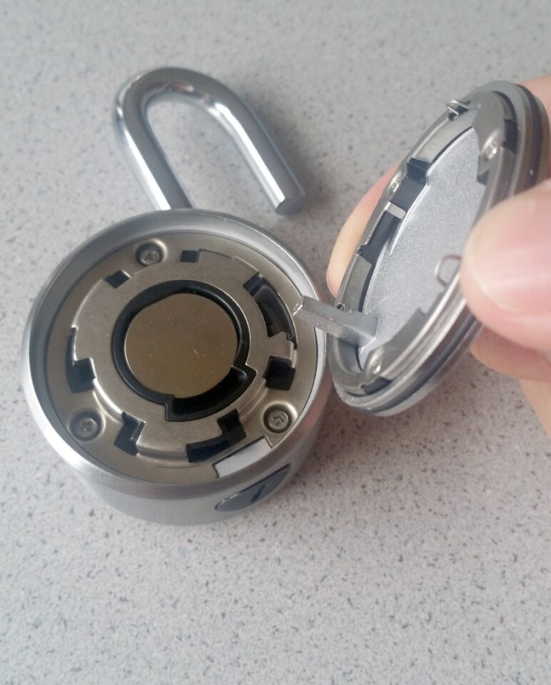 The Noke padlock's back plate removes (without tools) in order to change the battery