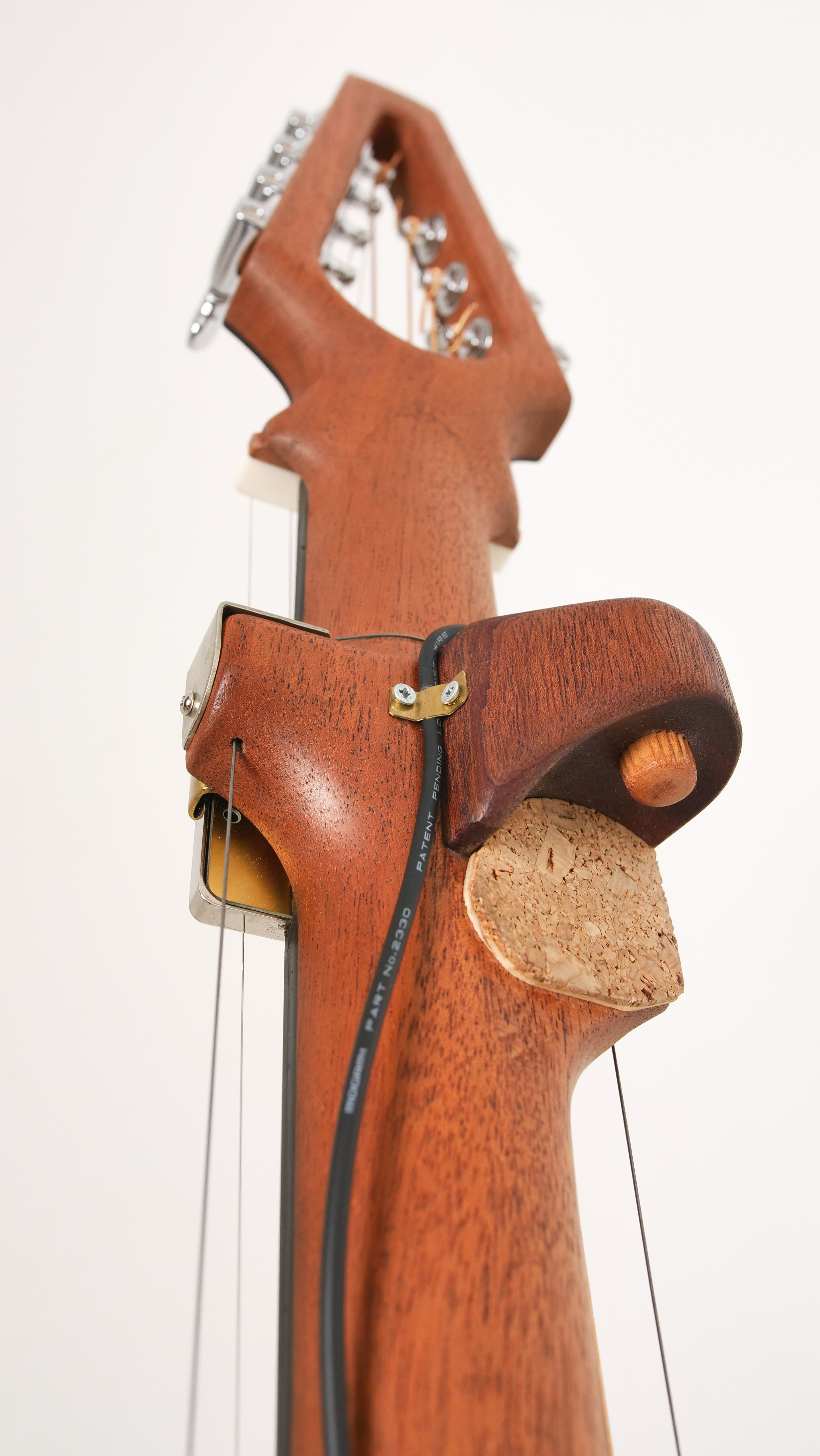 Clever attachment makes for melody, slide, bass and beats on one guitar