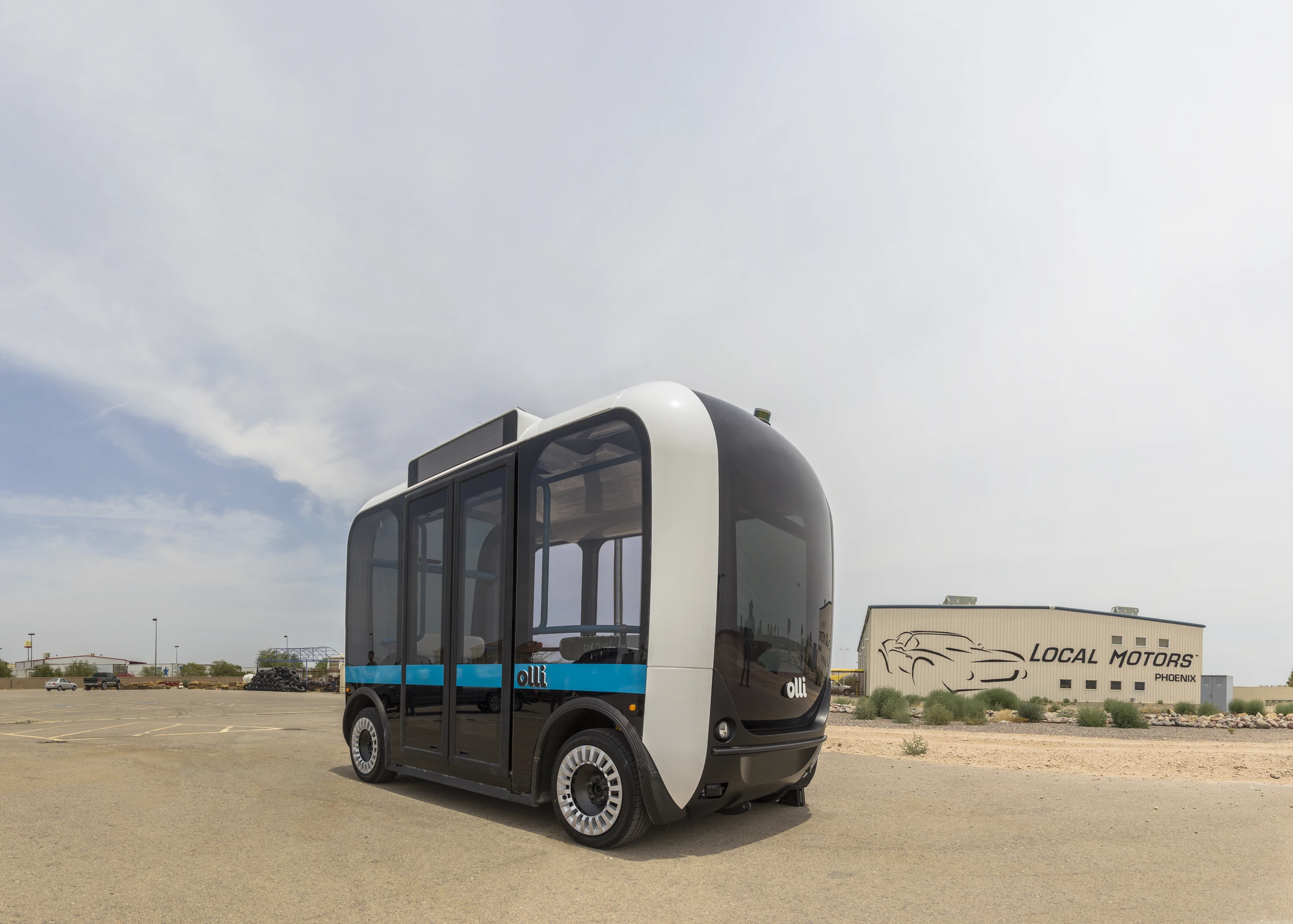 Local Motors demonstrated Olli the autonomous bus for the first time at the opening of its new facility just outside the nation's capital