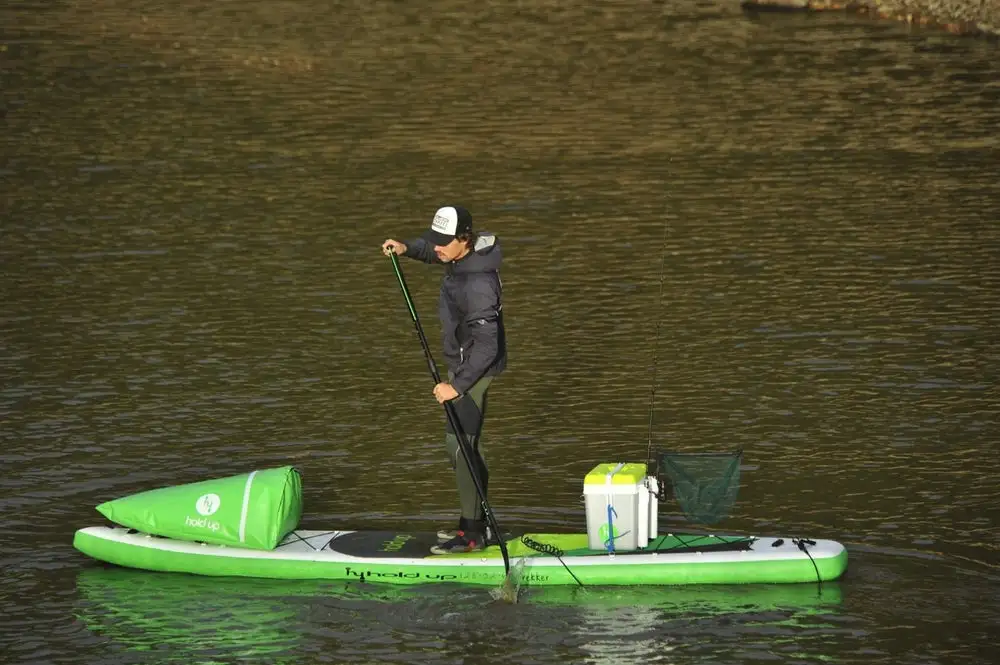During paddling, the Le Tunnel packs into a cone-shaped pack and rides on the board