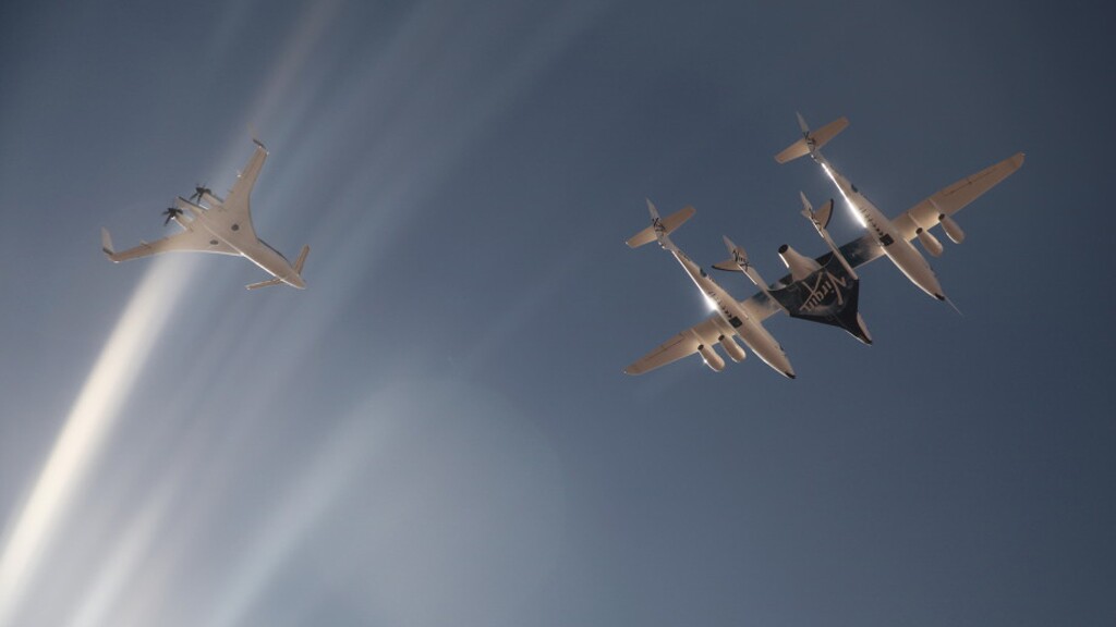 VSS Enterprise on its first manned flight attached to VMS Eve