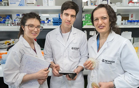 Mike McDonald, a recent ARC Future Fellow with Laura Woods (left) and Aysha Sezmis (right)