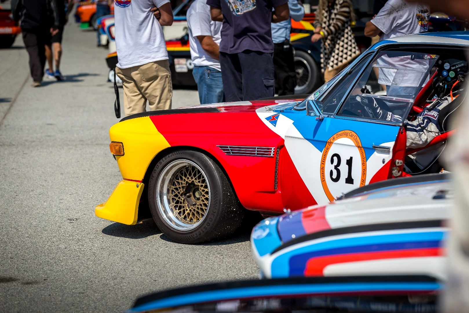 BMW waiting with its brethren for turn on the corkscrew