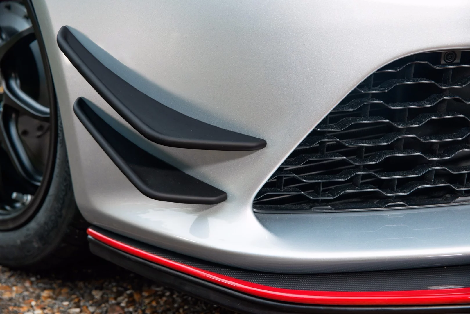 The Lotus Exige Sport 380 has a carbon fiber front splitter