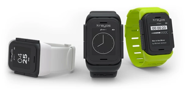 Some of the different watch face designs offered on the Kreyos Meteor, shown here attached to the wrist strap