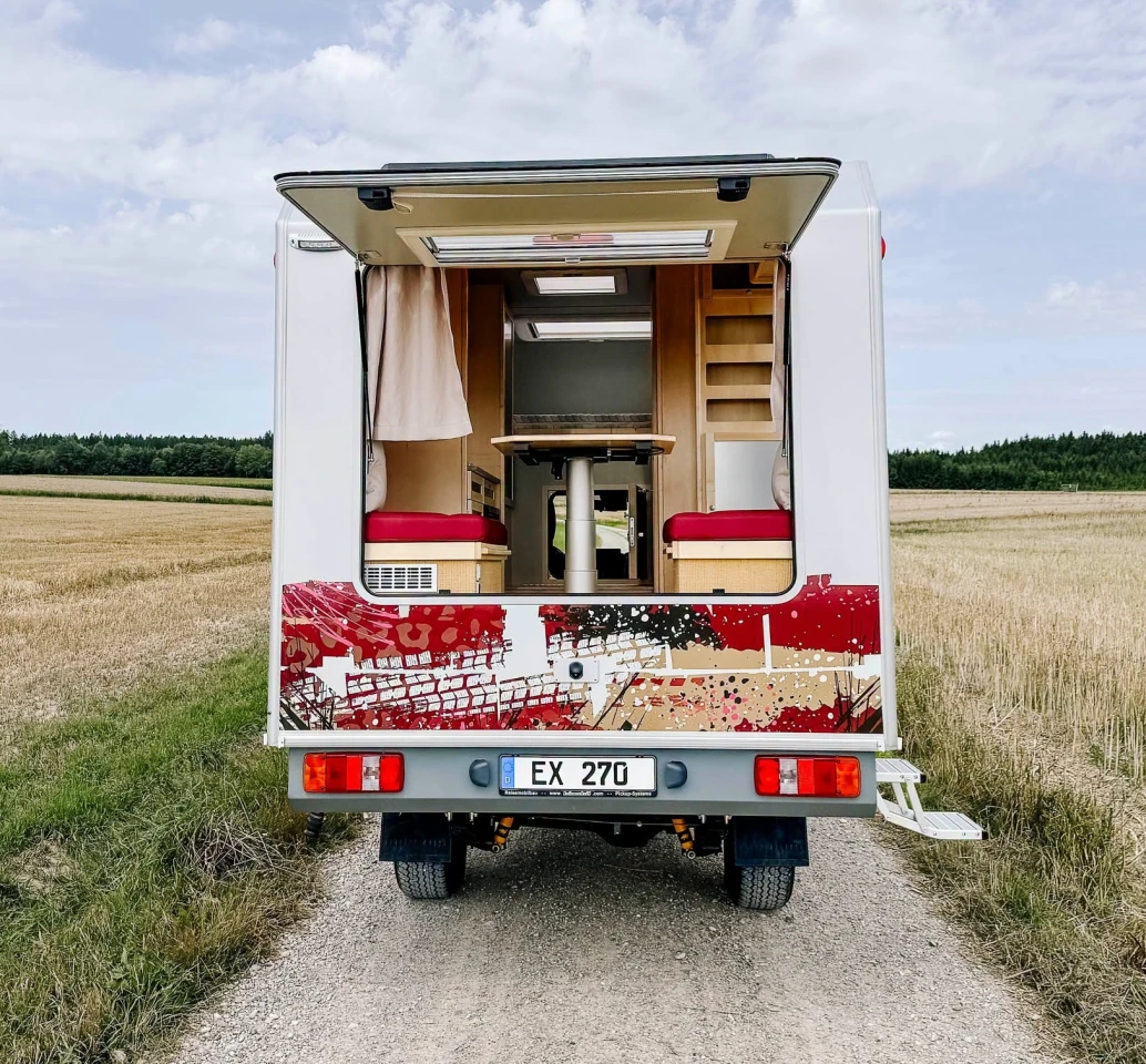 Many Bimobil models have a large hatch next to the dining area either in the rear or on the side