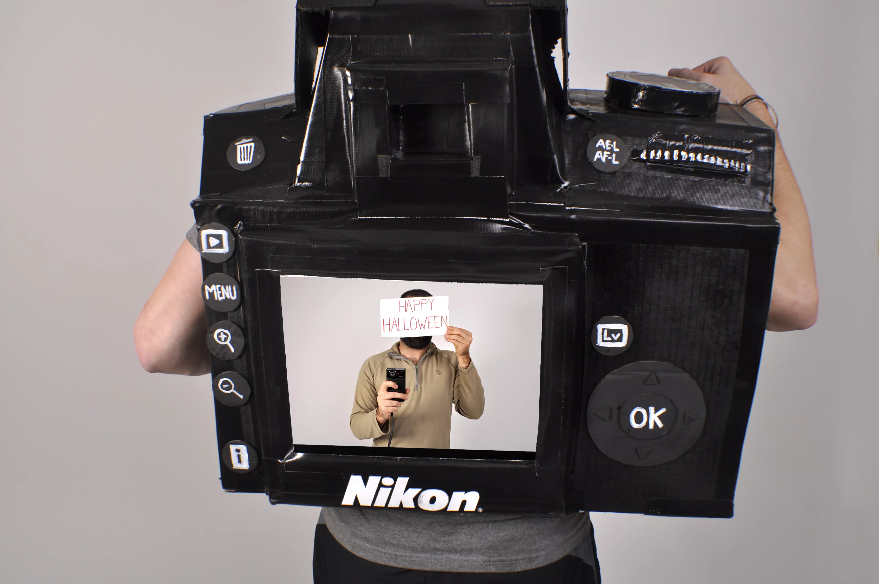 When the wearer presses the huge shutter release button on the front of the costume, the captured image is shown on the LCD screen on the back (Photo: Tyler Card)