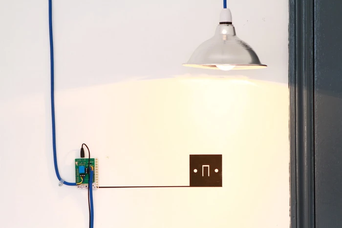 Touch Board can operate a switch when paired with a relay