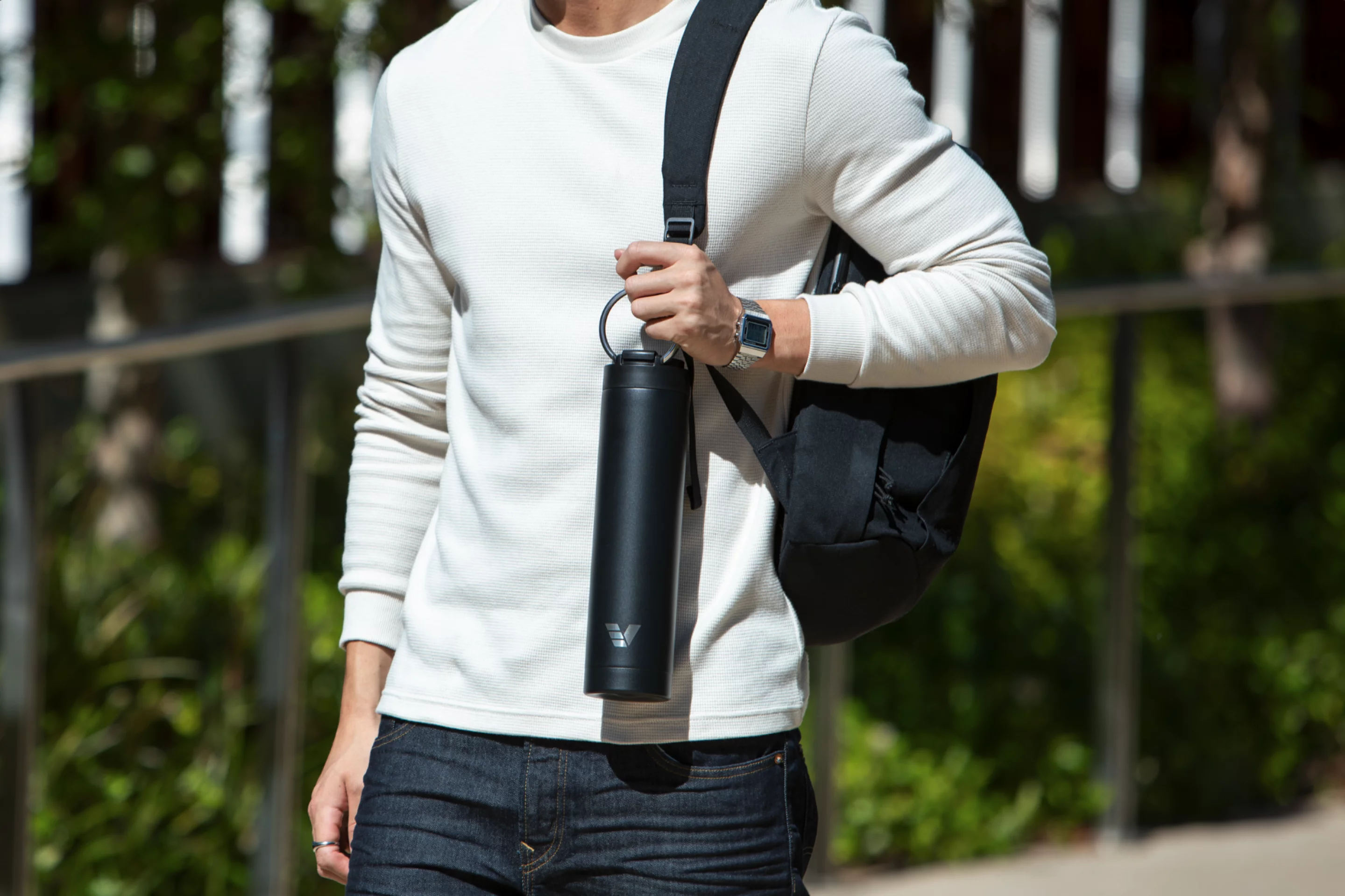 Slim 1L water bottle replaces 4 everyday essentials