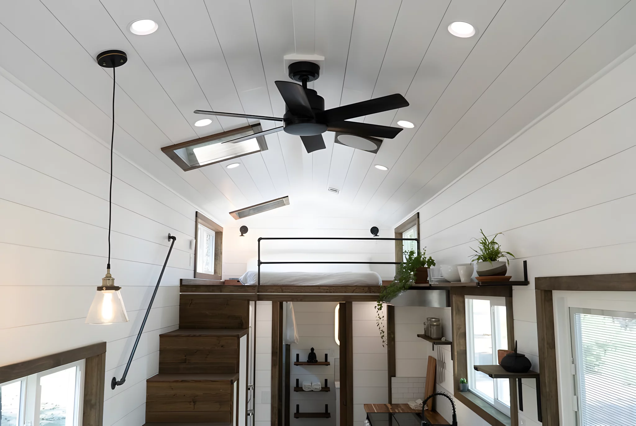 The Olympic's bedroom is reached by a storage-integrated staircase