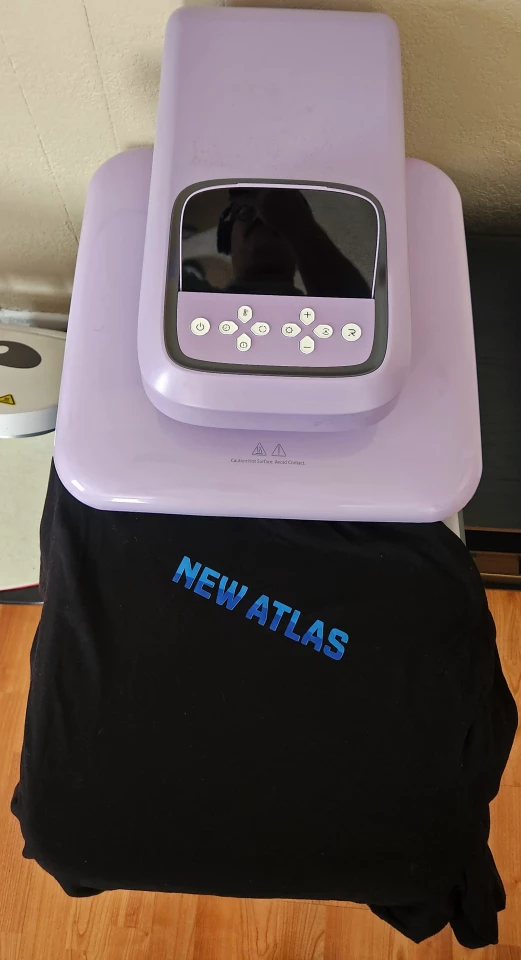 Pressing custom New Atlas apparel is as easy as pie. Actually, now that I'm thinking about it, I don't know how to make pie, so this is easier than pie