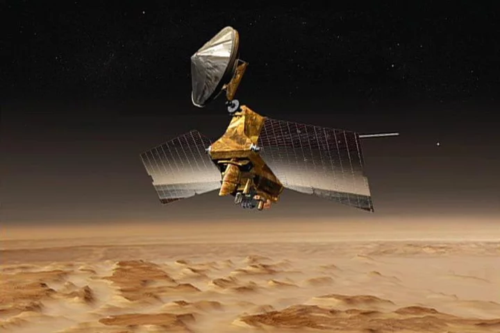 Artist's concept shows NASA's Mars Reconnaissance Orbiter mission over the Red Planet