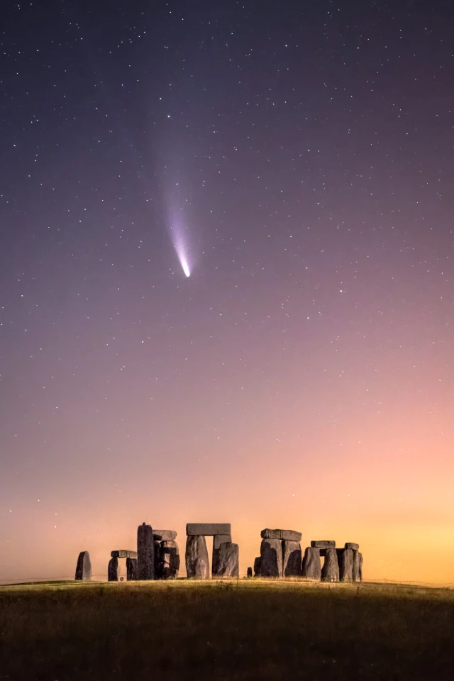'Comet NEOWISE over Stonehenge'. Comet NEOWISE passes over Stonehenge in the United Kingdom. The comet is due to return in approximately 6,800 years.