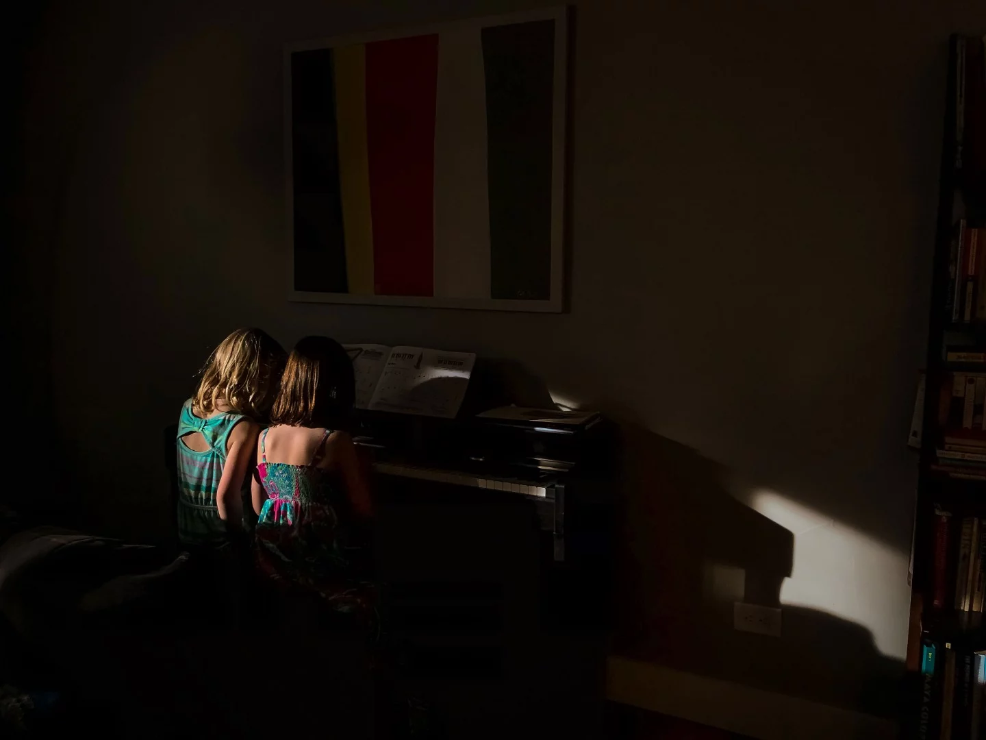 Winner of the Mobile category. Playing Piano shows a pair of friends trying to play music together, starkly lit and shot on a mobile device