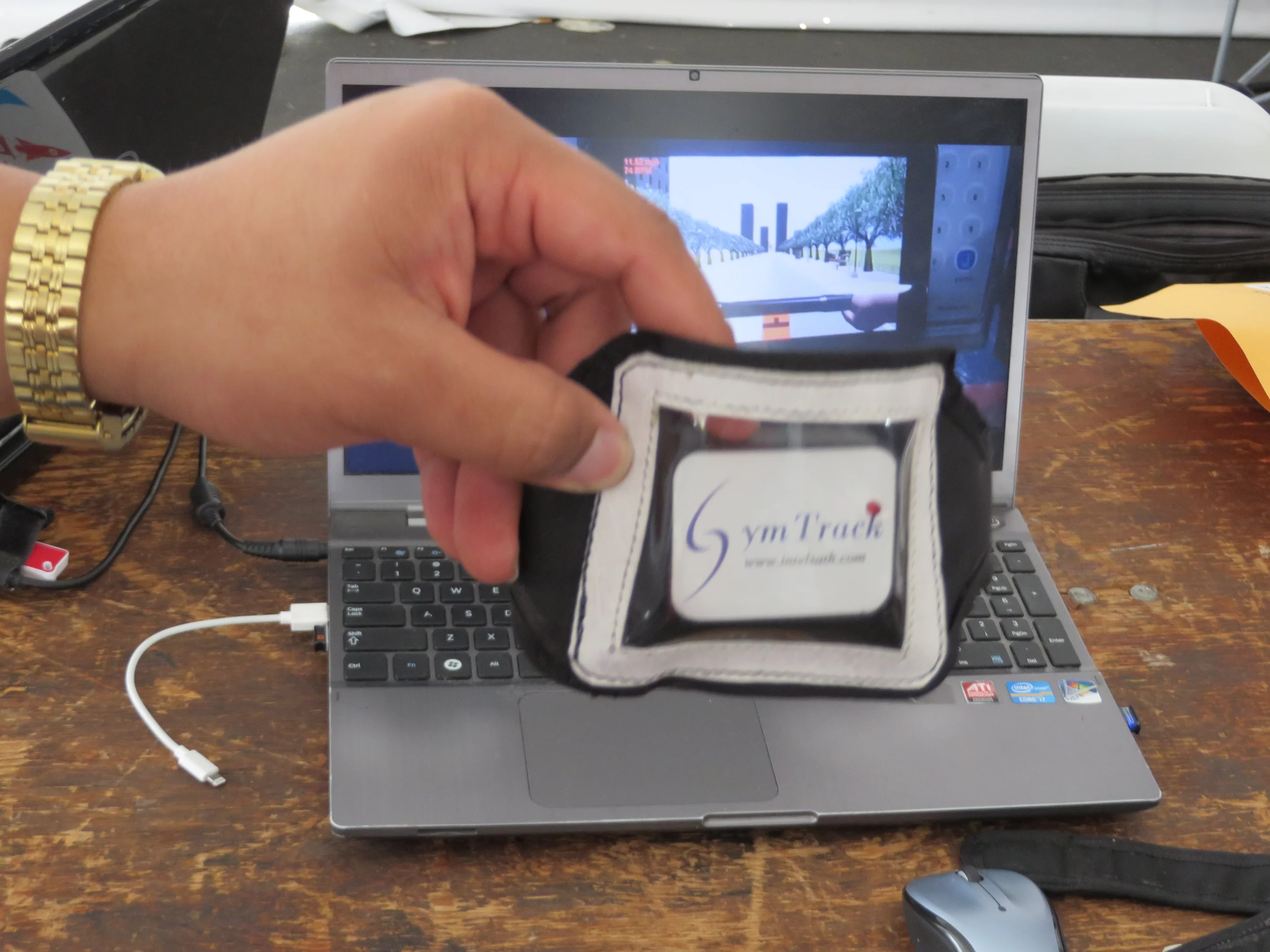 Gymtrack is a wearable that gamifies gym workouts by translating actual movements into a video game