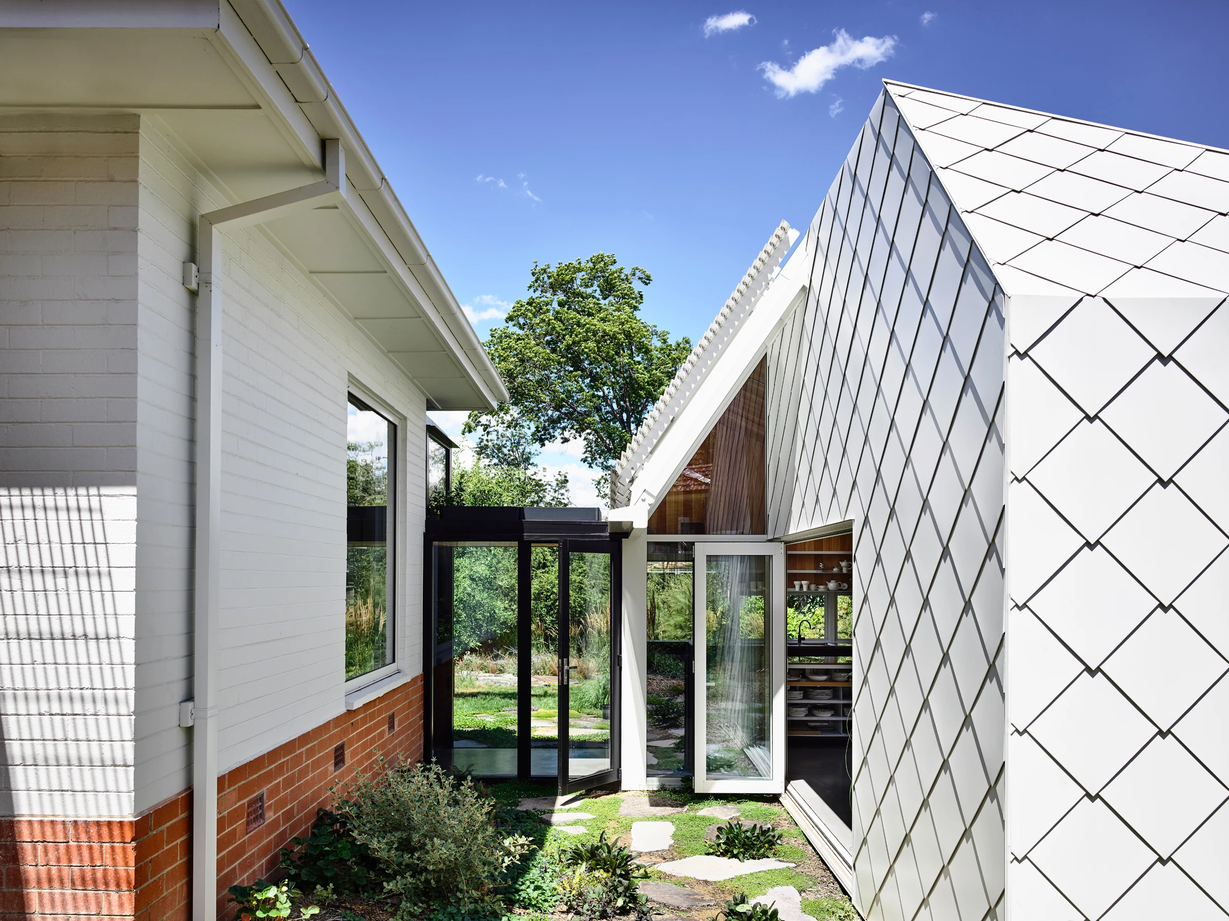 Empire Canberra's original bungalow is connected to the new extensions with glazed corridors