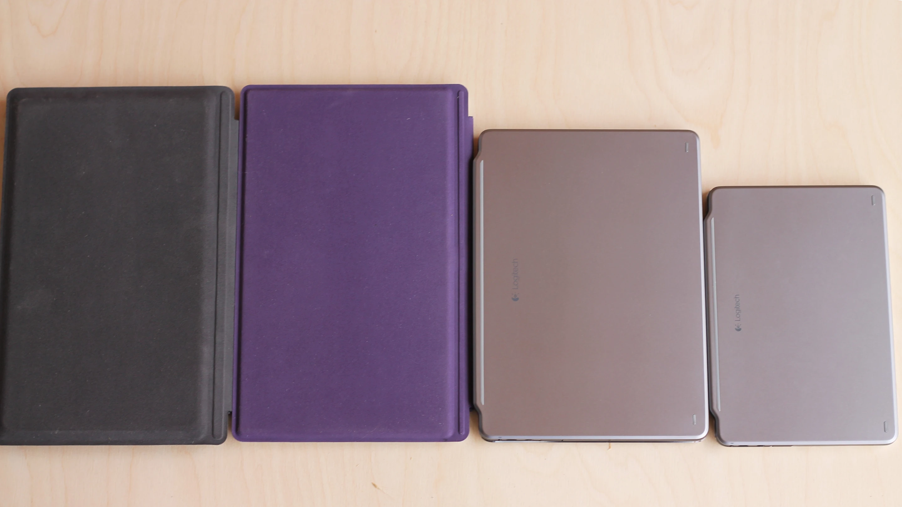 All four of our devices with keyboard covers closed