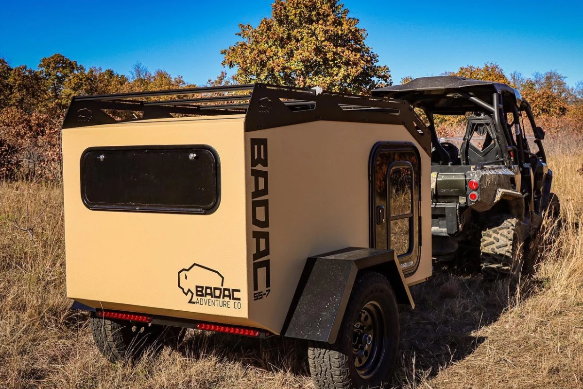 Badac keeps things as compact as possible by trading out the rear kitchen for a simple storage hatch that invites owners to bring their own cooking gear along