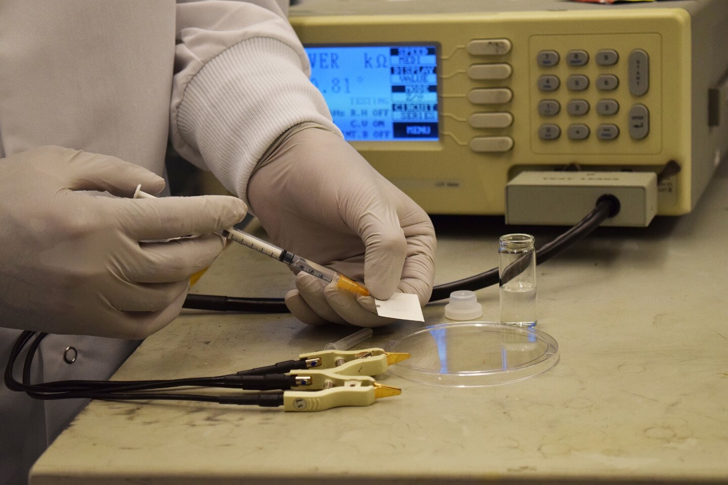 After wearing the badge, a drop of water is added to the yeast colony to test radiation exposure – the more yeast cells that have died, the more radiation the wearer was exposed to