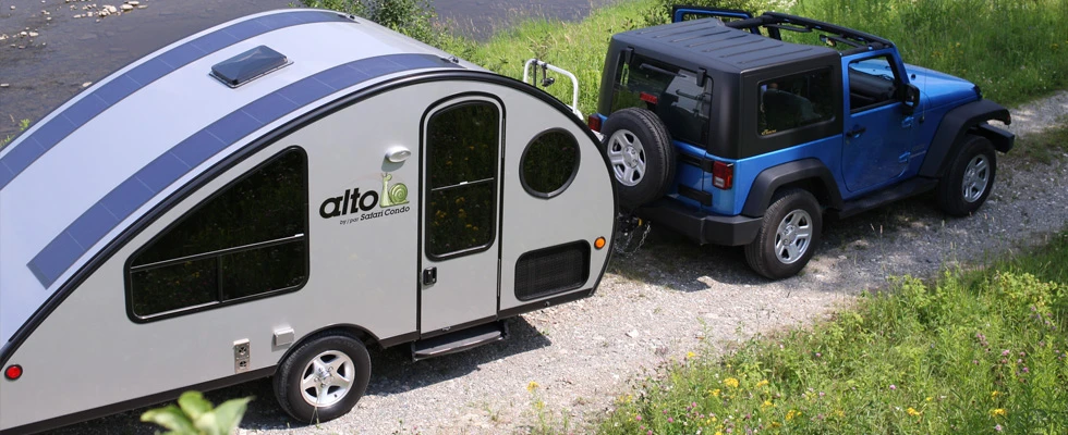 The Safari Condo Alto R 1723 is a pop-top teardrop trailer