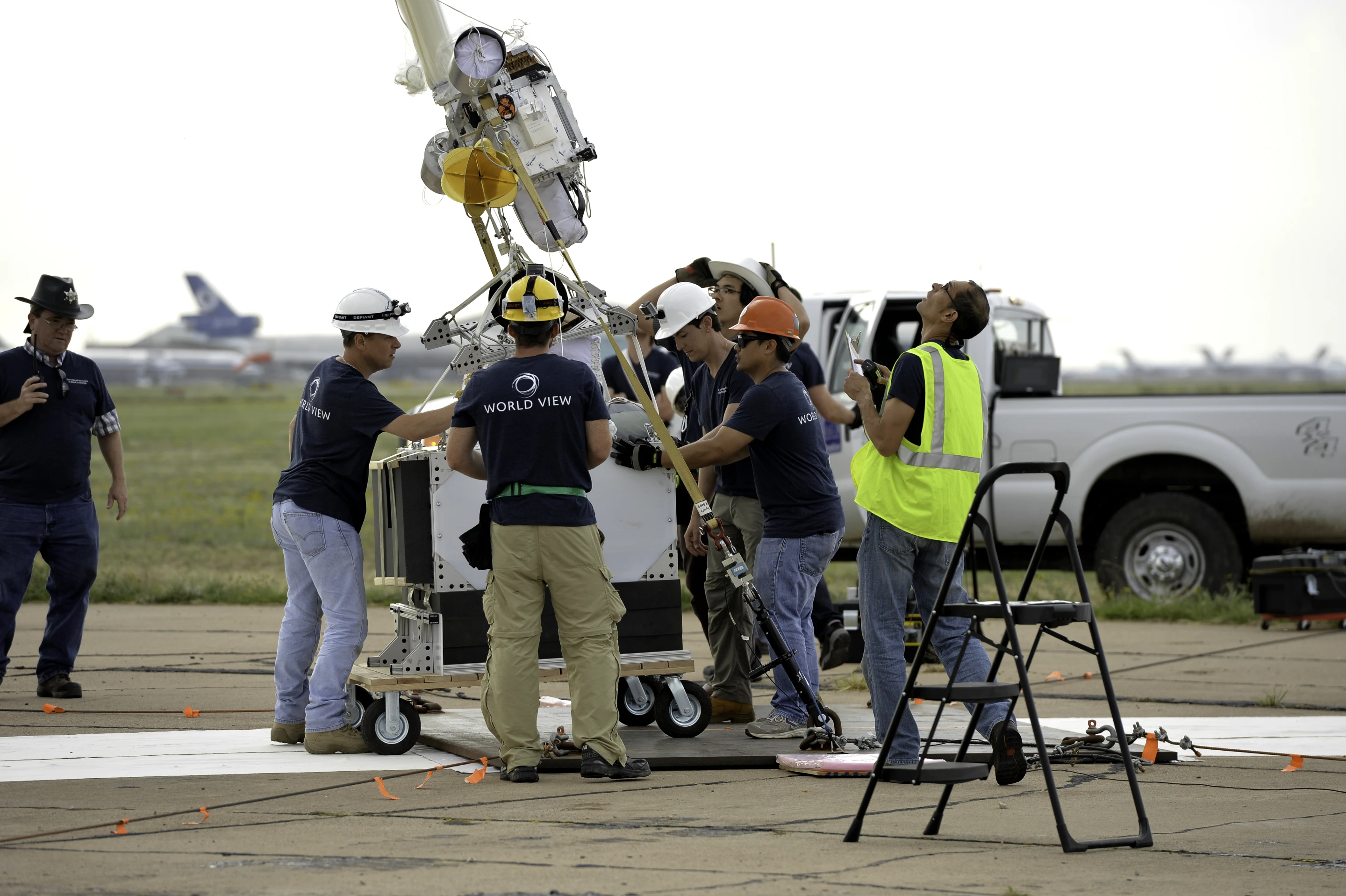 The World View team prepares a 450-lb payload to be carried via high-altitude balloon to 120,000 ft during scaled test flight (Image: World View Enterprises)