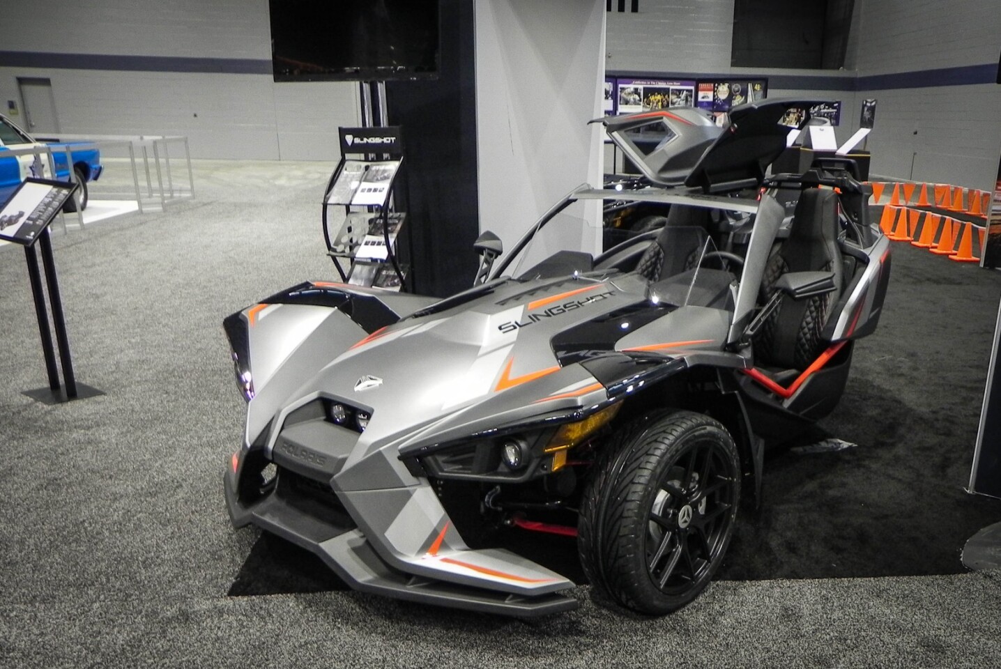 The Slingshot Grand Touring takes the standard three-wheeler model and permanently affixes the otherwise optional roof while adding a few other things as more useful fixtures