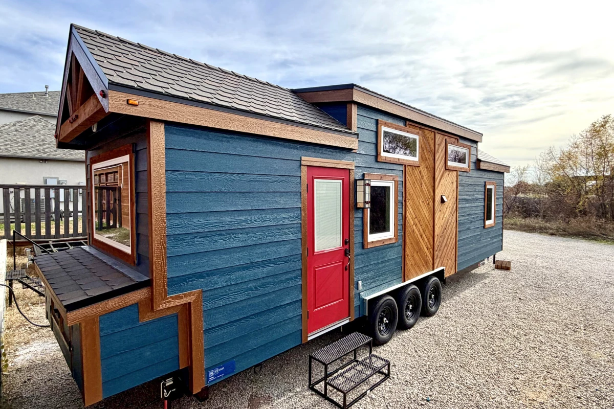 The Seawillow tiny house, by Decathlon Tiny Homes, features a cheerful seaside-inspired decor and compact but a surprisingly livable layout